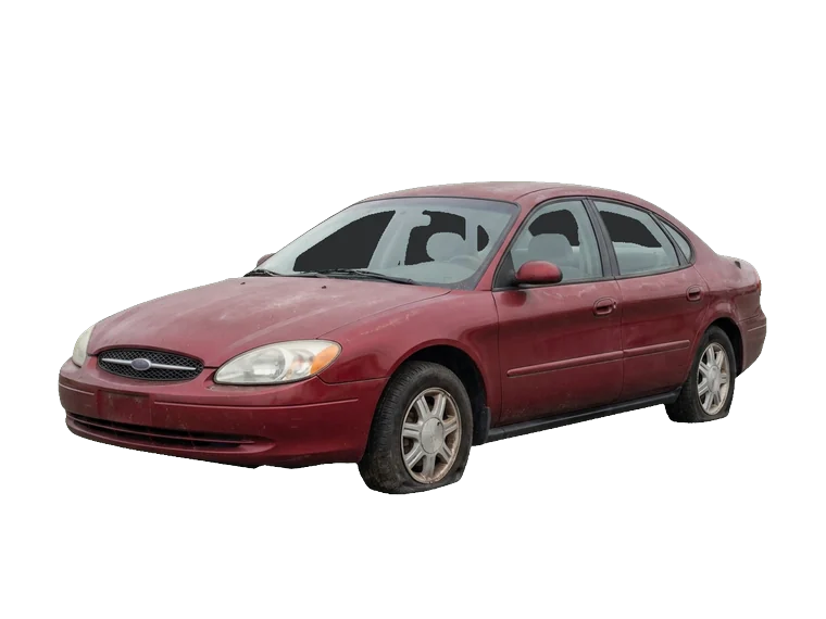 Auto scrap immobilisée, pneus dégonflés